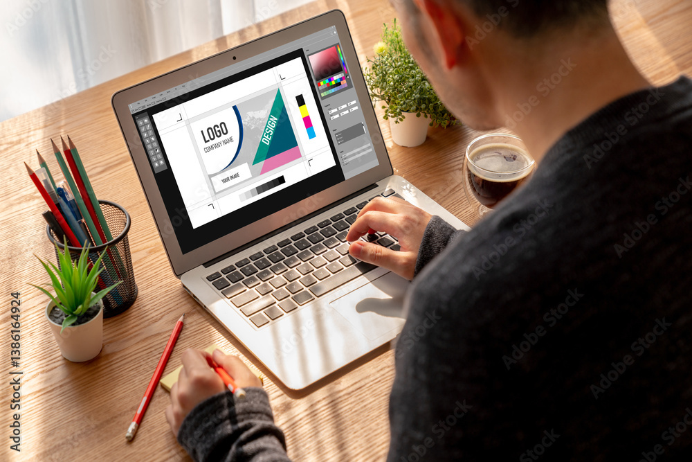 Wall mural graphic designer software for modern design of web page and commercial ads showing on the computer s