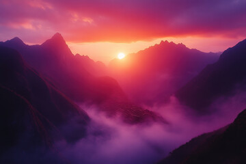 Obraz premium Sun setting over the mountains, casting a warm glow on the rugged peaks and bathing the landscape in a tranquil golden light.