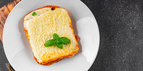 Lasagna vegetarian no meat bechamel, tomato sauce, vegetable dish vegetables organic product fresh tasty gourmet food background on the table rustic food top view copy space