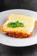 Lasagna vegetarian no meat bechamel, tomato sauce, vegetable dish vegetables organic product fresh tasty gourmet food background on the table rustic food top view copy space