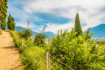 Arco castle ruins on cliffs above Garda lake, Trentino, Italy. Lago di garda