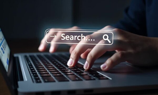 SEO search engine optimization concept, marketing ranking traffic website, internet technology for business company. Businessman using laptop with search bar on virtual screen