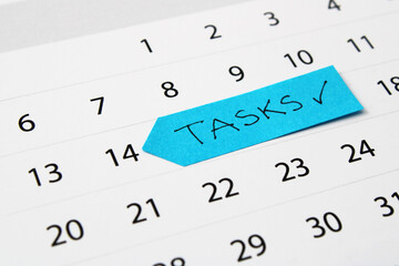 Sticky note with tasks checkmark