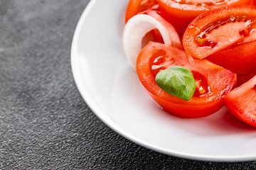 Tomato salad appetizer vegetables dish organic product fresh tasty gourmet food background on the table rustic food top view copy space keto and paleo diet vegetarian and vegan food