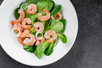 Shrimp salad seafood dish fresh gourmet food background on table rustic food top view copy space