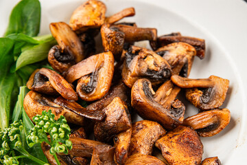 Mushroom fried champignon dish fresh gourmet food background on the table rustic food top view copy space vegetarian and vegan food