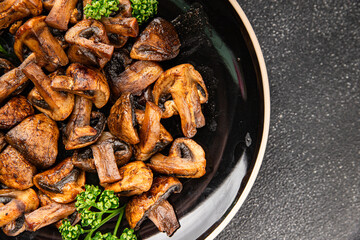 Mushroom fried champignon dish fresh gourmet food background on the table rustic food top view copy space vegetarian and vegan food