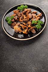 Mushroom fried champignon dish fresh gourmet food background on the table rustic food top view copy space vegetarian and vegan food