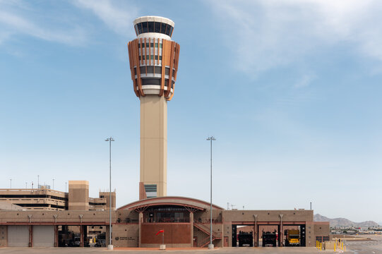 Phoenix, AZ - March 31, 2025: Airport Traffic Control Tower  and Phoenix Fire Department Station 19 at the Phoenix Sky Harbor International Airport.