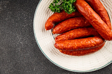 Sausages smoked pork meat beef dish fresh gourmet food background on table rustic food top view copy space
