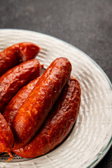 Sausages smoked pork meat beef dish fresh gourmet food background on table rustic food top view copy space