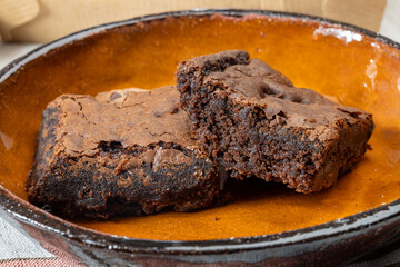 American chocolate brownie, dark chocolate baked dessert bar fudgy or cakey sweet dessert