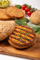 Make burger buns with vegan or vegetarian patties or burgers made from soybeans, grains, vegetables, grilled healthy food