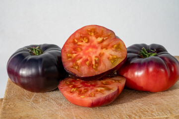Ripe organic tomato Purple Calabash close up