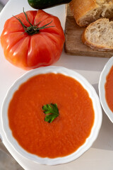 Famous vegetables soup from Cordoba, Andalusia salmorejo served cold in restaurant for lunch as starter dish close up