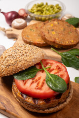 Make burger buns with vegan or vegetarian patties or burgers made from soybeans, grains, vegetables, grilled healthy food