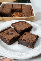 American chocolate brownie, dark chocolate baked dessert bar fudgy or cakey sweet dessert