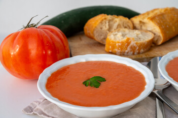 Famous vegetables soup from Cordoba, Andalusia salmorejo served cold in restaurant for lunch as starter dish close up