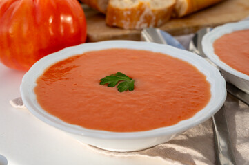 Famous vegetables soup from Cordoba, Andalusia salmorejo served cold in restaurant for lunch as starter dish close up