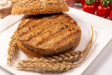 Make burger buns with vegan or vegetarian patties or burgers made from grains, vital wheat gluten food, grilled healthy food