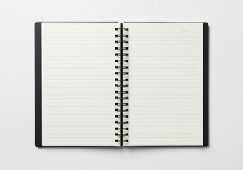 Open notebook with spiral binding and blank lined pages isolated on white background
