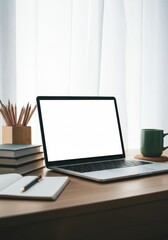 Fototapeta premium Minimalist workspace with a laptop, notebook, and coffee cup on a wooden desk