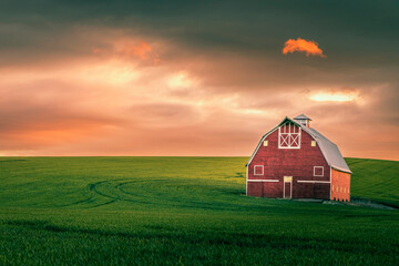 Red barn in the Palouse at sunrise