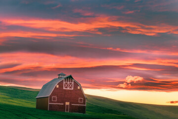 Red barn in the Palouse at sunrise