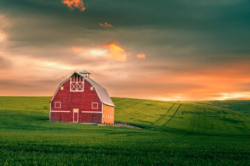 Red barn in the Palouse at sunrise
