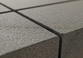 Obraz premium Close-up of Textured Gray Concrete Blocks, Building Materials, Construction Elements.