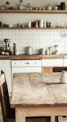 Rustic wooden table in a cozy, minimalistic kitchen with warm tones and open shelving.