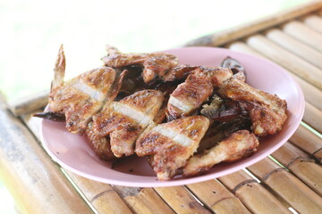Grilled chicken on plate at a restaurant