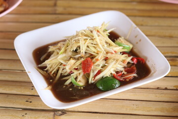 Spicy papaya salad in a restaurant