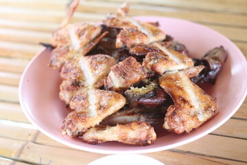 Grilled chicken on plate at a restaurant