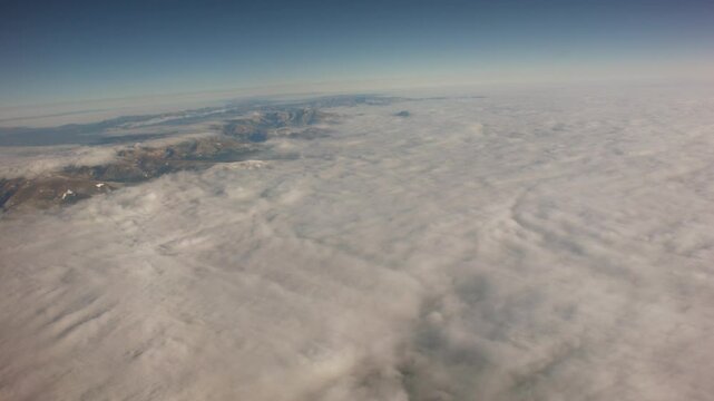 Aerial Rocky Mountains with Clouds