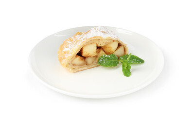 Piece of tasty apple strudel with powdered sugar and mint isolated on white