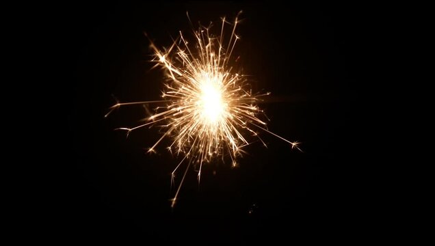 sparks on firecrackers on a black background.