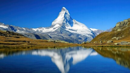 Naklejka premium Majestic mountain peak reflected in tranquil alpine lake