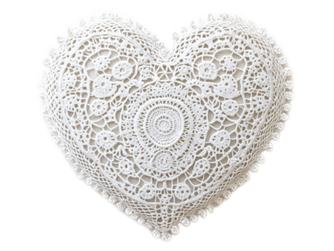 Lace doily heart with intricate Victorian pattern and scalloped edges on white background
