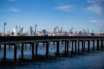 Fototapeta premium Manhattan's beautiful skyline, New York, United States. Panorama view of New York city skyline in Midtown Manhattan. USA, NYC, NY, Manhattan. American big city. Lower Manhattan skyline.