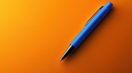 blue pen against an orange background, featuring plenty of space for text.