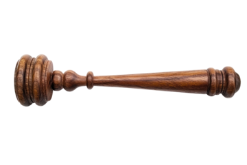 A close-up of a polished wooden judge gavel resting on its soundboard with fine grain details, isolated against a pure white background