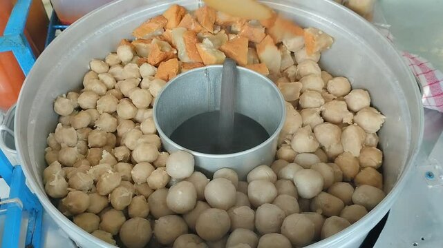 Indonesian street food called cilok or meatball skewers or bakso tusuk which are sold on the side of the road