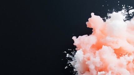 A vibrant peach and white ink cloud dominates the image, its wispy texture suggesting movement. Its set against a stark black background, creating a high contrast. The image features soft lighting an