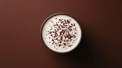 A creamy cappuccino with chocolate sprinkles. Featuring indulgence and warmth