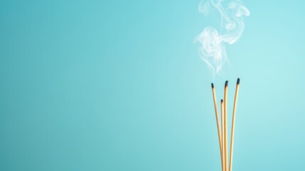 Obraz premium Brightly colored background, creative representation of incense sticks producing fragrant smoke, calming atmosphere for relaxation.