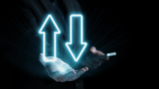 Hands display upward and downward arrows symbolizing the balance between quality and cost, illustrating critical business concepts such as growth and management strategies. Qubit
