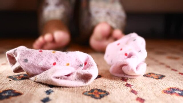 Closeup of dirty socks on a carpet 