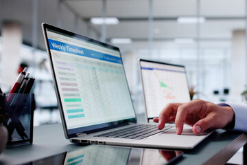 Busy Man In Office Using Computer