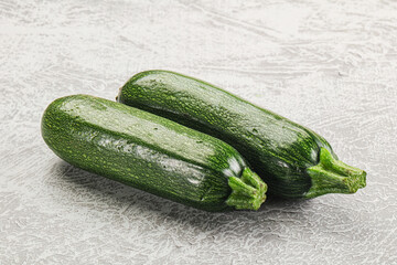 Raw green ripe zucchini vegetable